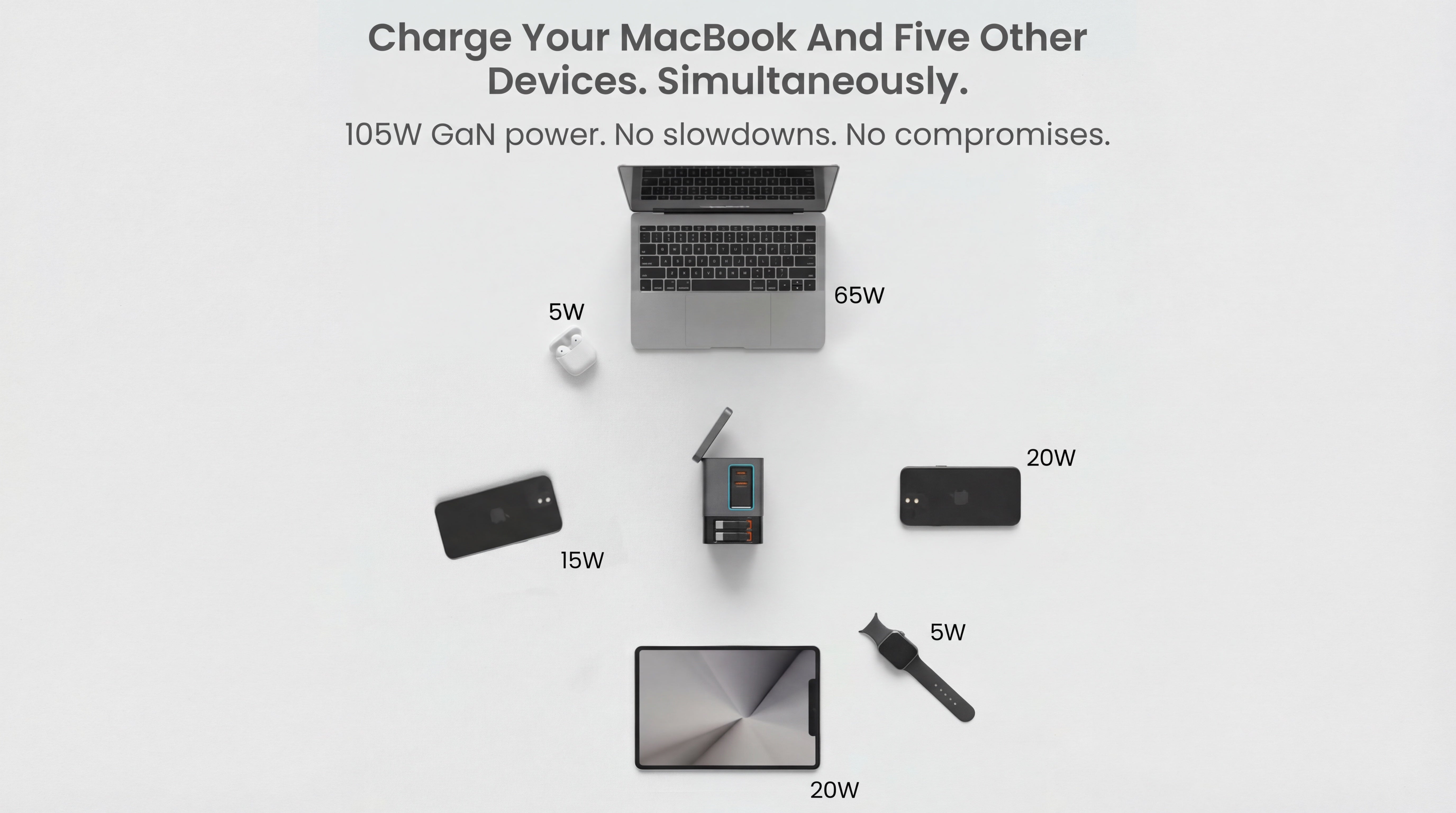 Laptop and multiple electronic devices with charging power ratings on a white background