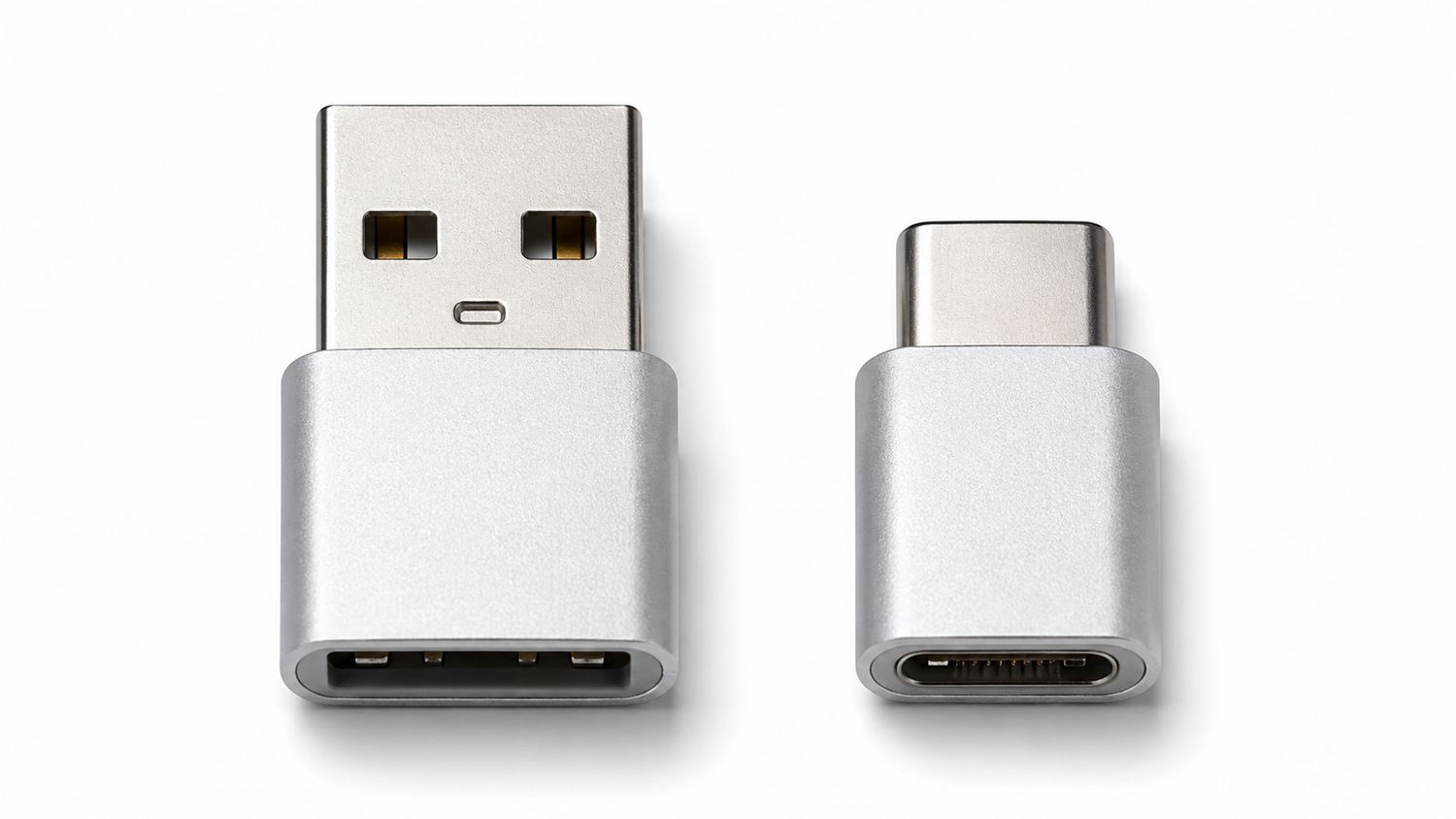 USB-A vs USB-C connectors side by side — the flat rectangular USB-A port on the left and the smaller oval USB-C port on the right