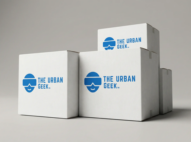 Three 'The Urban Geek' branded boxes on a gray background